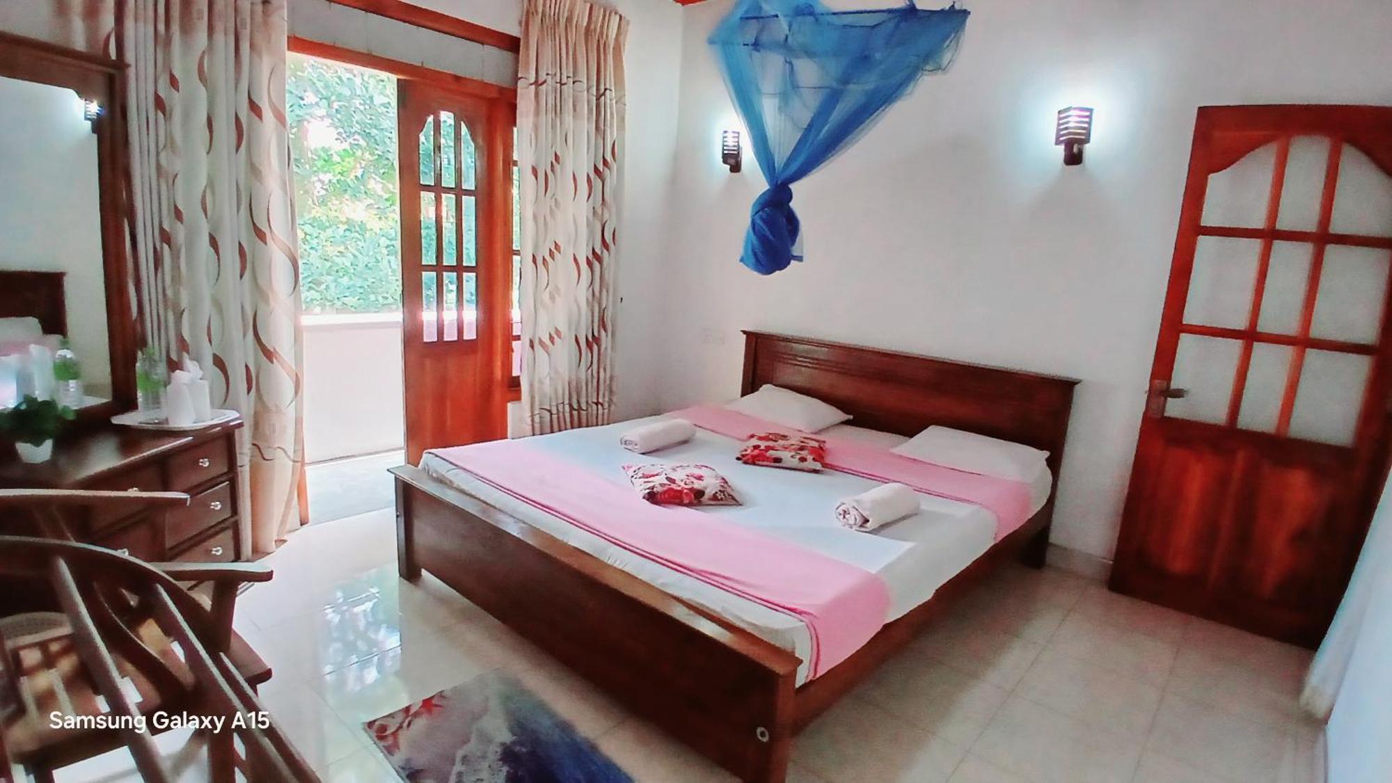 Jasmine Garden Inn Ела Стая снимка